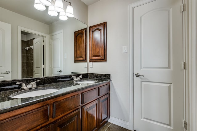 bathroom with vanity and tile patterned floors