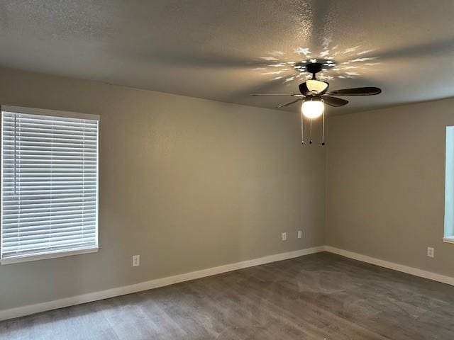 unfurnished room with ceiling fan