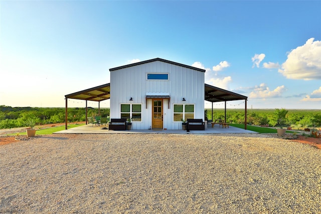 exterior space with an outdoor living space and a patio area