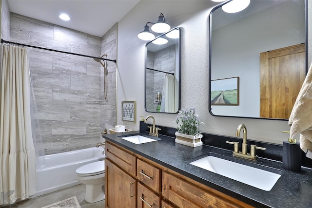 full bathroom with vanity, toilet, and shower / bath combo with shower curtain