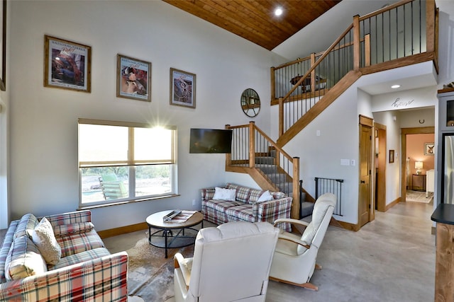 living room with high vaulted ceiling and wooden ceiling