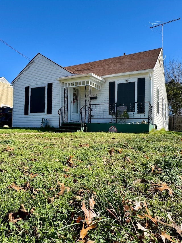 ranch-style house with a front lawn