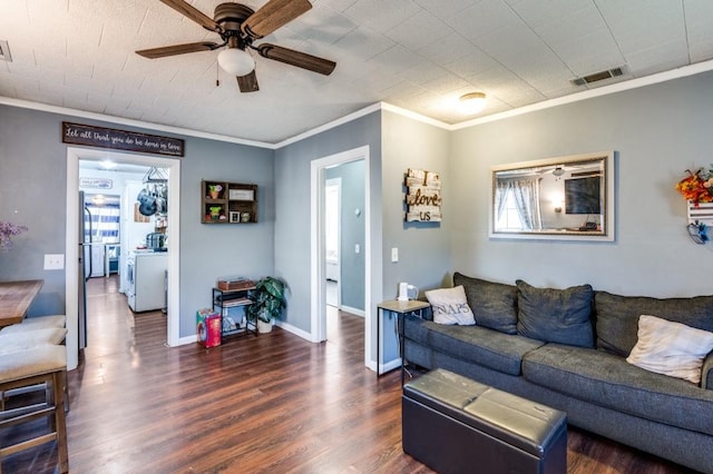 living room featuring ceiling fan, crown molding, and dark wood-type flooring