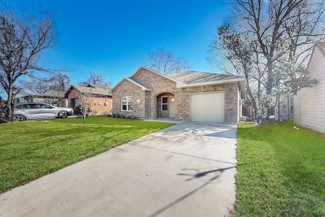 single story home with a garage and a front lawn