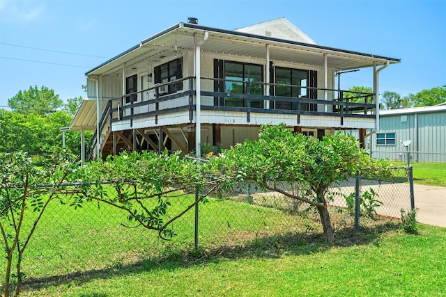 exterior space featuring a front lawn