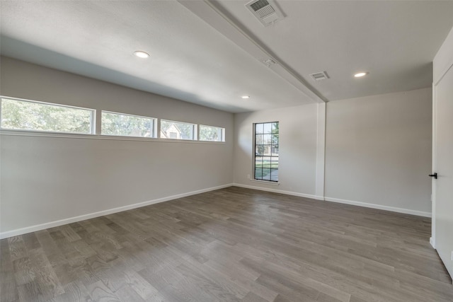 empty room featuring hardwood / wood-style floors