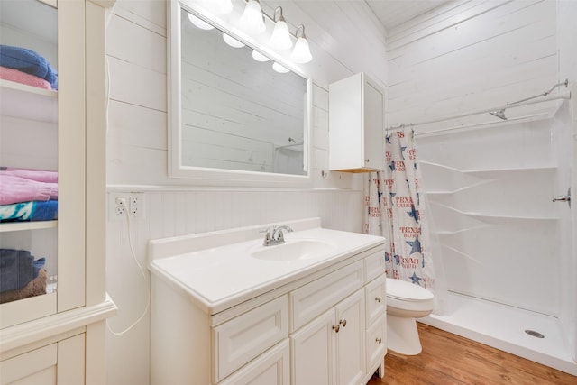 bathroom with a shower with curtain, wooden walls, wood-type flooring, and toilet