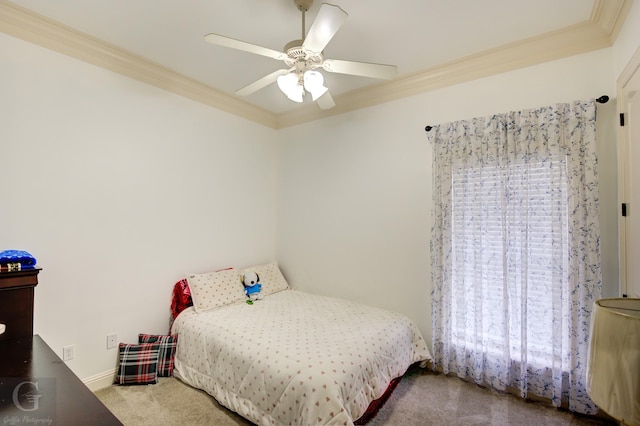 bedroom with ceiling fan, light colored carpet, and ornamental molding