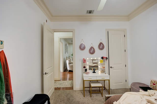 carpeted bedroom with crown molding