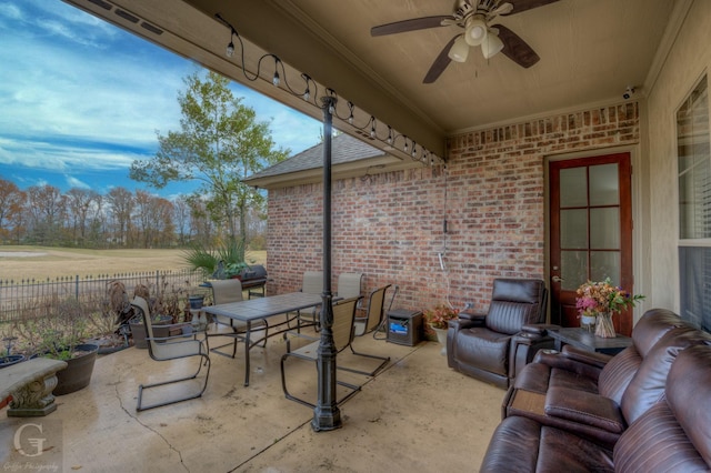 view of patio featuring ceiling fan and an outdoor hangout area