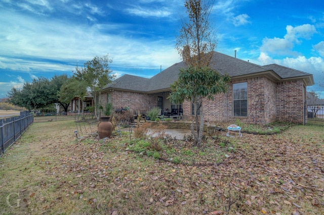 rear view of house featuring a patio area