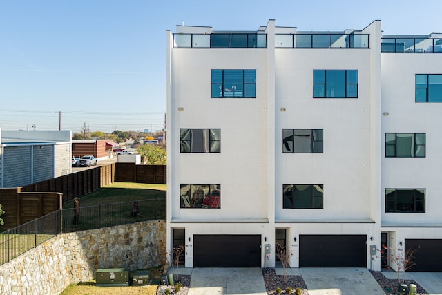 view of property featuring a garage