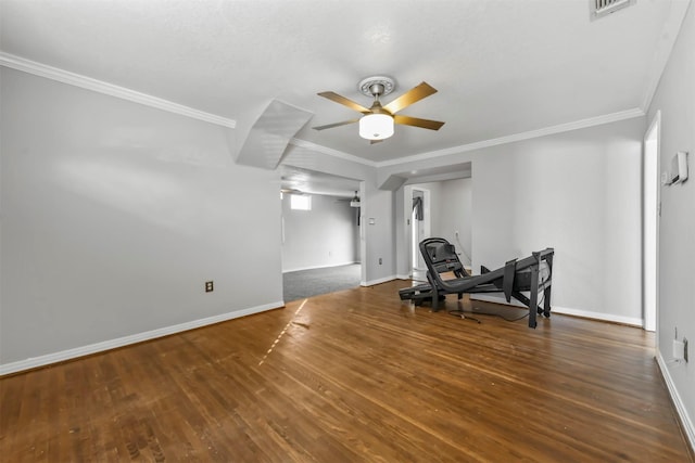 unfurnished room with dark hardwood / wood-style floors, ceiling fan, and ornamental molding