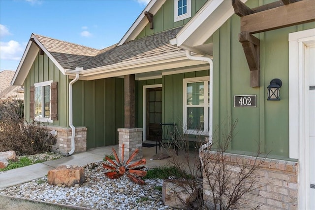 view of exterior entry with covered porch