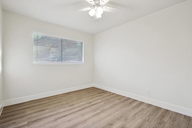 unfurnished room with light hardwood / wood-style flooring and ceiling fan