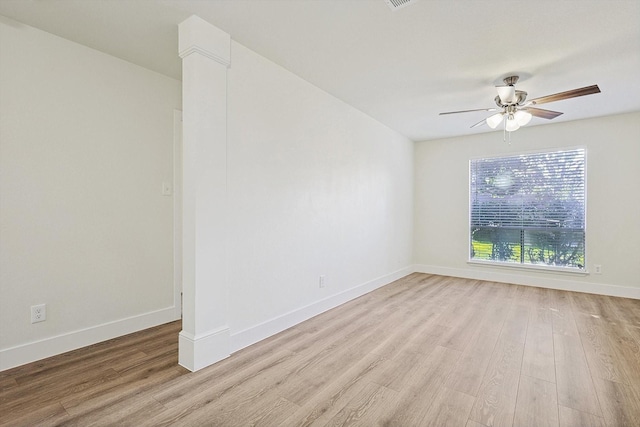 unfurnished room with light wood-type flooring and ceiling fan