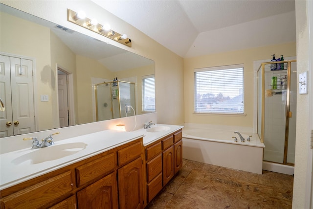 bathroom featuring vanity, plus walk in shower, and vaulted ceiling