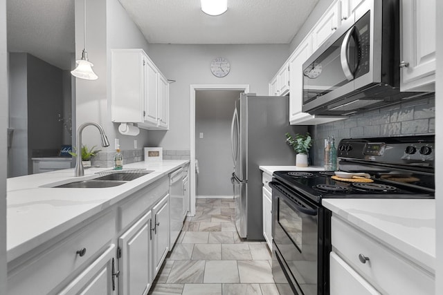 kitchen with white cabinets, black range with electric stovetop, and dishwasher