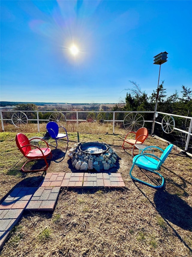 exterior space featuring an outdoor fire pit