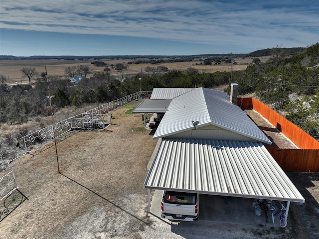 birds eye view of property featuring a rural view