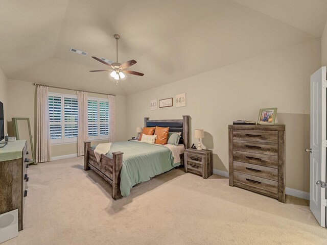 carpeted bedroom with lofted ceiling and ceiling fan