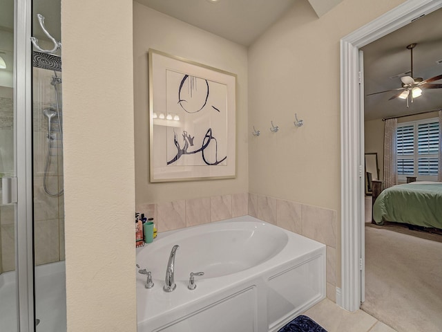 bathroom featuring ceiling fan, tile patterned floors, and separate shower and tub