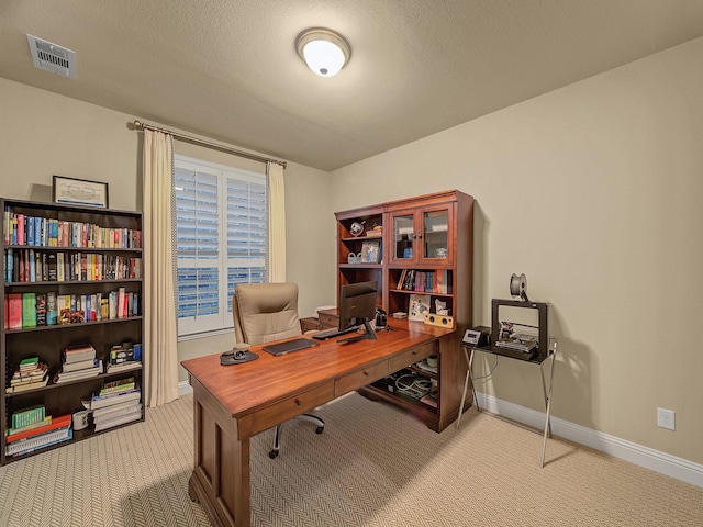 home office with light carpet