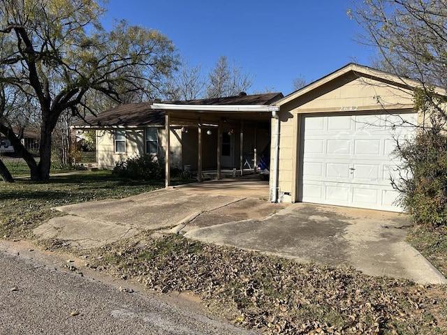 ranch-style house featuring a carport