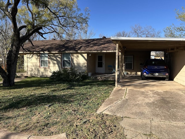 single story home featuring a front yard and a carport