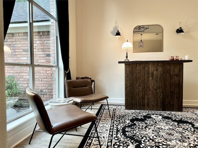 living area with light hardwood / wood-style floors