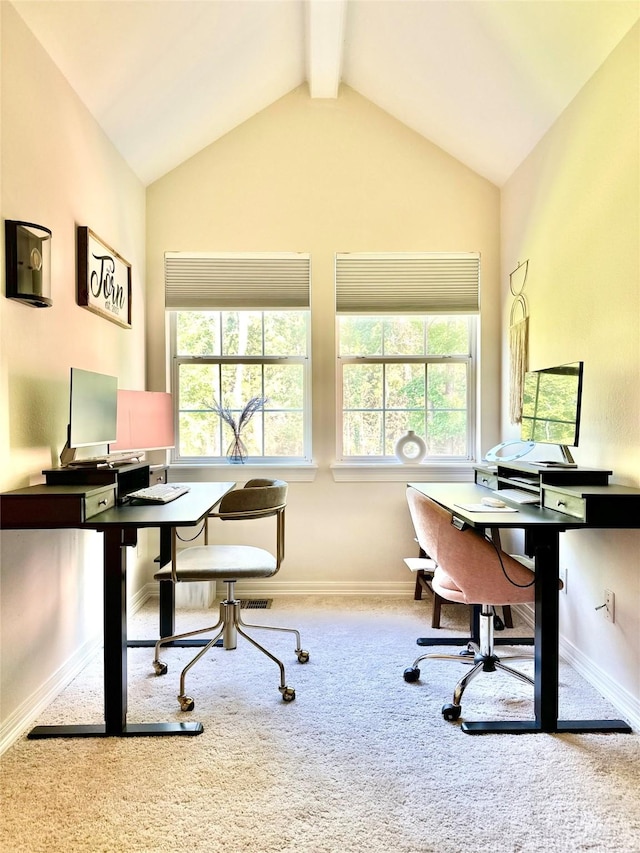 home office featuring carpet and lofted ceiling with beams