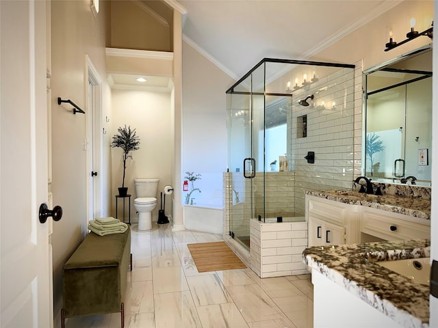 full bathroom featuring shower with separate bathtub, vanity, toilet, and ornamental molding