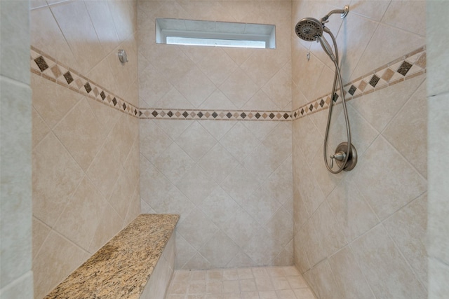 bathroom featuring tiled shower