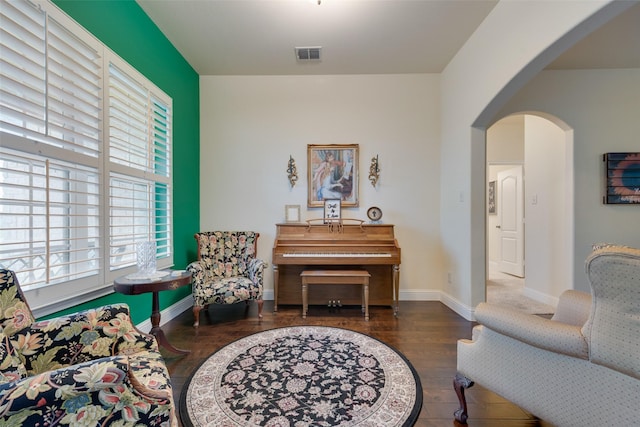 living area with dark wood-type flooring