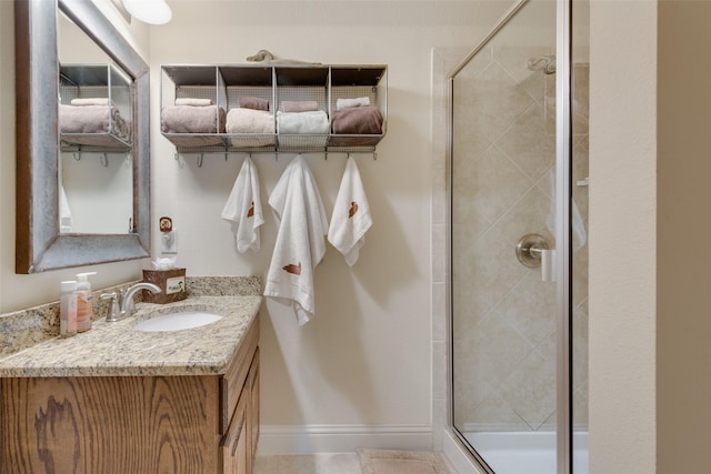 bathroom with vanity and walk in shower