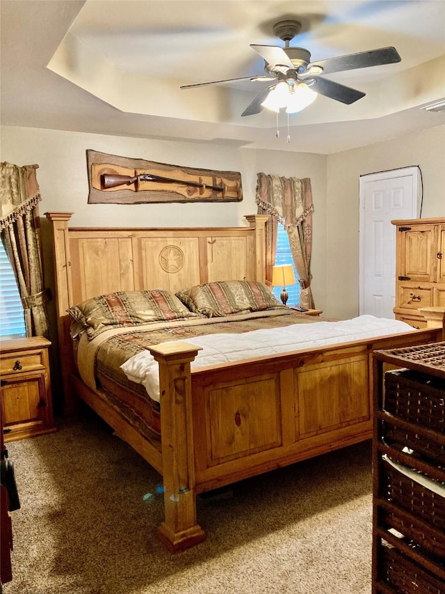 bedroom with light colored carpet and ceiling fan