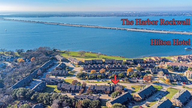 aerial view featuring a residential view and a water view