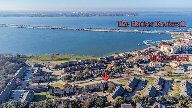 aerial view with a water view and a residential view