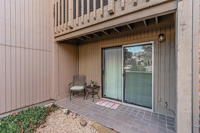 doorway to property with a patio area