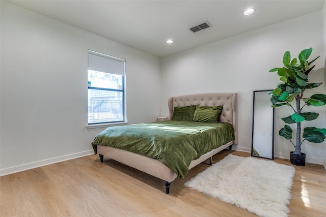 bedroom featuring wood-type flooring