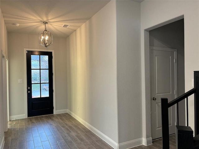 foyer featuring a notable chandelier