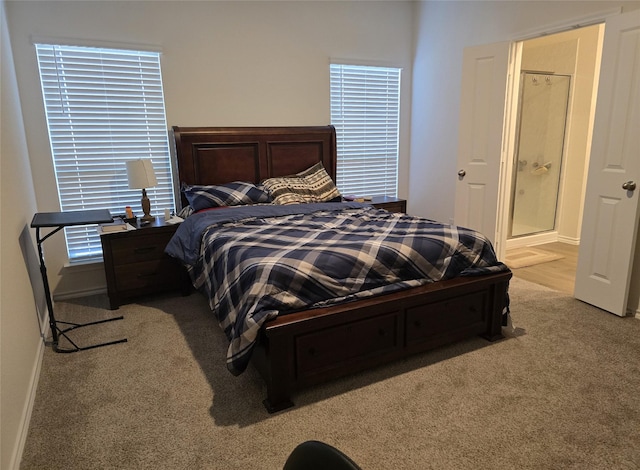 bedroom featuring light colored carpet