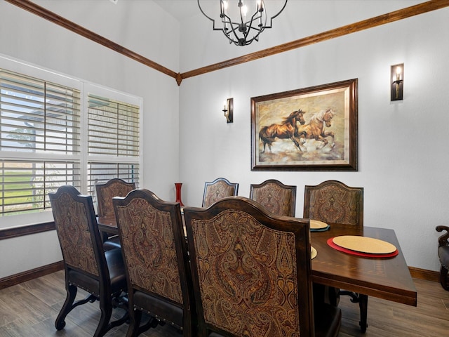 dining area featuring wood-type flooring and a chandelier