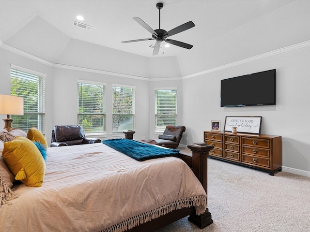 bedroom with multiple windows, ornamental molding, light colored carpet, and ceiling fan