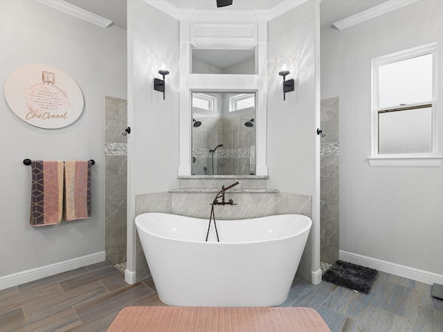 bathroom with crown molding and shower with separate bathtub