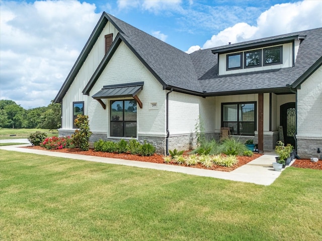 view of front of home with a front yard