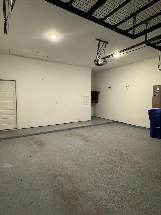 garage featuring a garage door opener