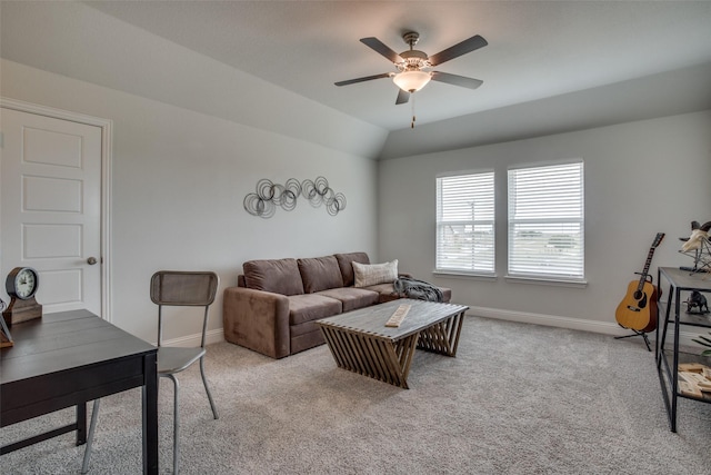 living room with ceiling fan, light colored carpet, and vaulted ceiling