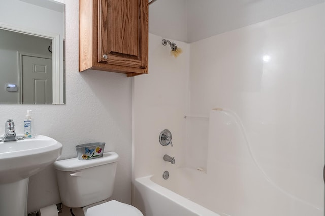 full bathroom with sink, toilet, and tub / shower combination