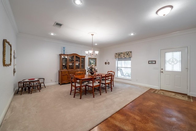 dining space with light colored carpet, crown molding, and an inviting chandelier